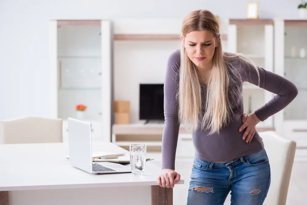 Pregnant woman at home getting ready for childbirth