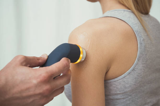 a woman having a ultrasound therapy