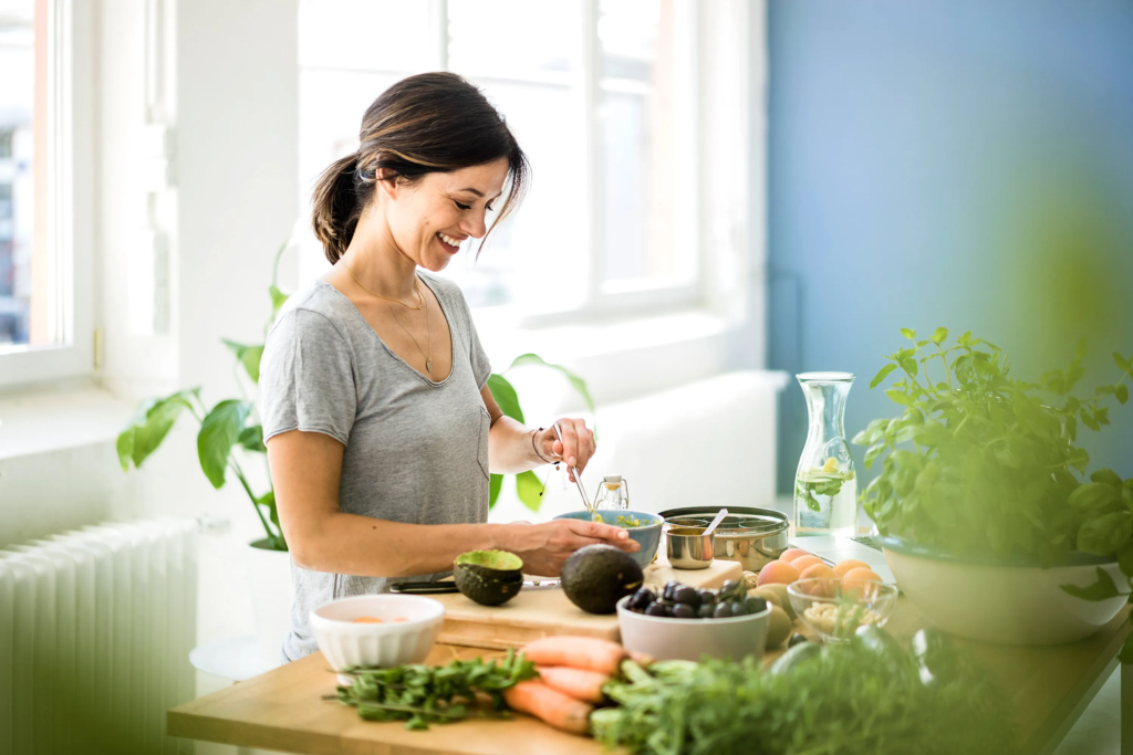 a woman making a salad